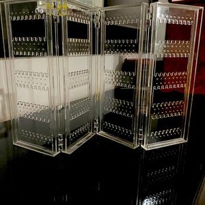 Clear, folding earring holder